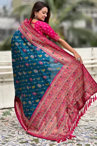 Teal blue woven self design silk blend patola saree with blouse