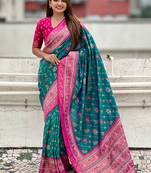 Teal green woven self design silk blend patola saree with blouse