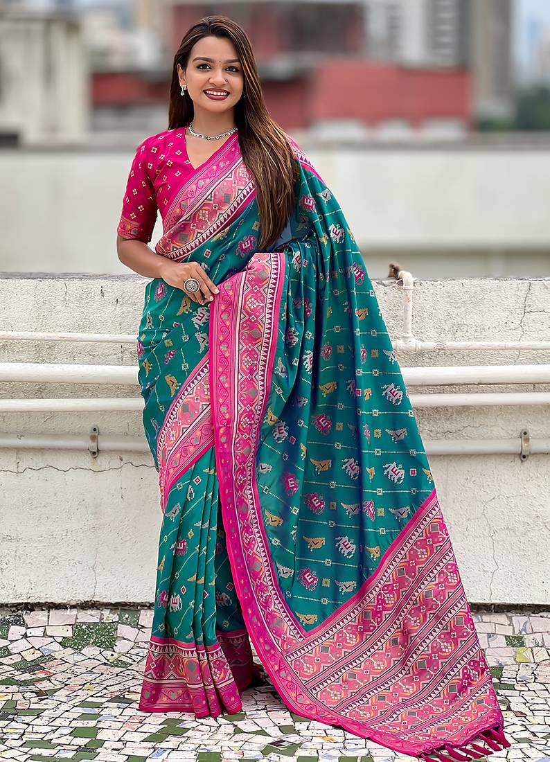 Teal green woven self design silk blend patola saree with blouse