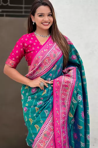 Teal green woven self design silk blend patola saree with blouse