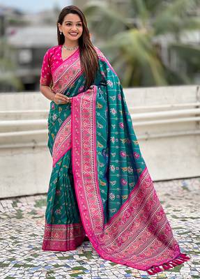 Teal green woven self design silk blend patola saree with blouse 3