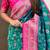 Teal green woven self design silk blend patola saree with blouse