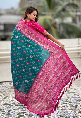 Teal green woven self design silk blend patola saree with blouse 5