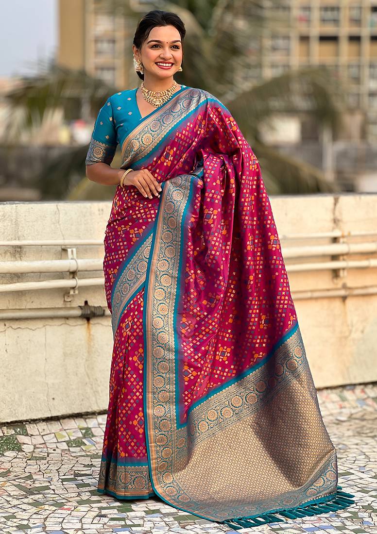 Magenta woven self design silk blend patola saree with blouse