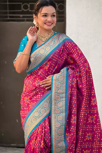 Magenta woven self design silk blend patola saree with blouse