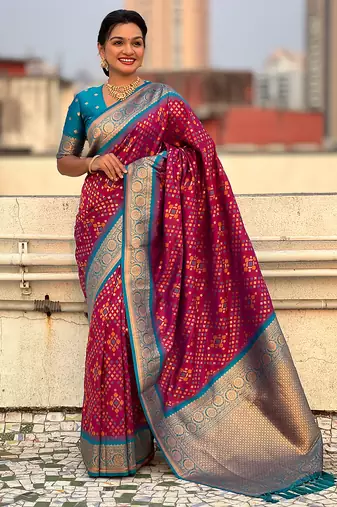 Magenta woven self design silk blend patola saree with blouse