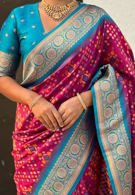 Magenta woven self design silk blend patola saree with blouse 4