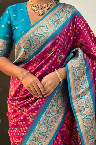 Magenta woven self design silk blend patola saree with blouse