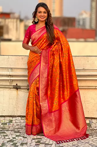 Orange woven self design silk blend patola saree with blouse