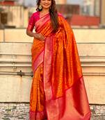 Orange woven self design silk blend patola saree with blouse