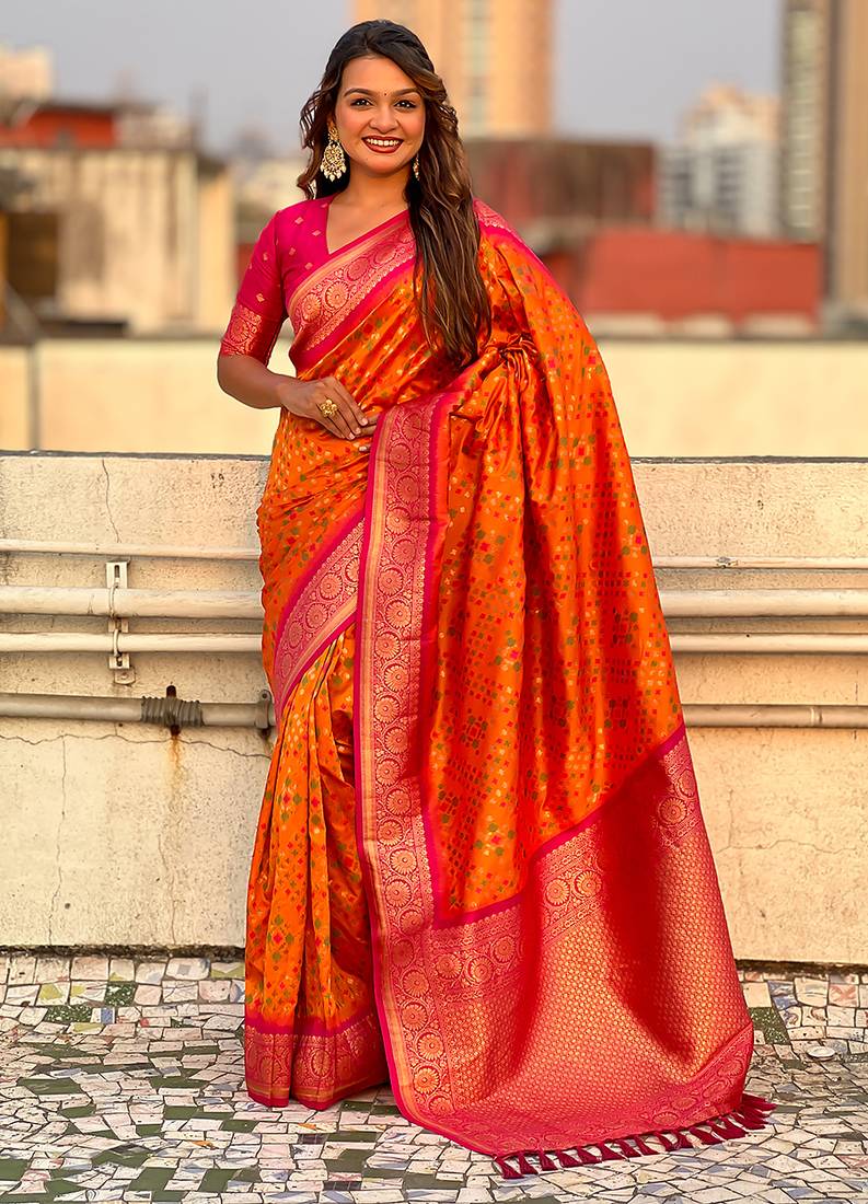 Orange woven self design silk blend patola saree with blouse