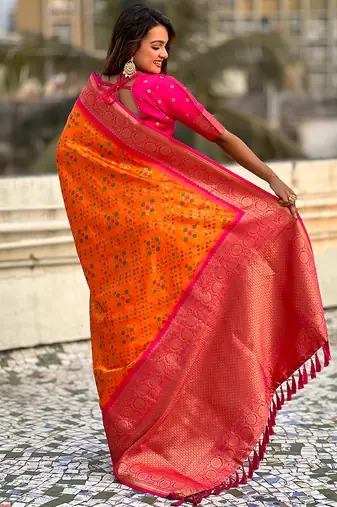 Orange woven self design silk blend patola saree with blouse