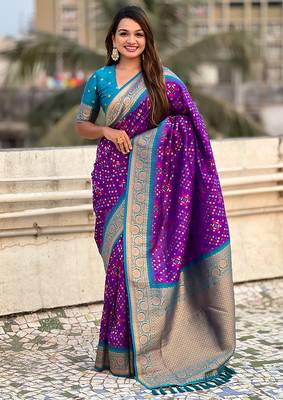 Purple woven self design silk blend patola saree with blouse 1