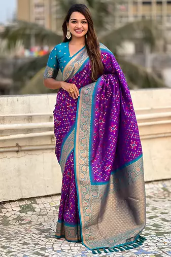 Purple woven self design silk blend patola saree with blouse