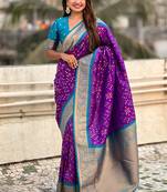 Purple woven self design silk blend patola saree with blouse