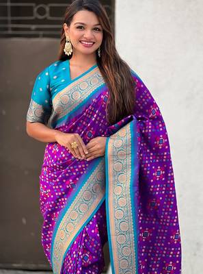Purple woven self design silk blend patola saree with blouse 2