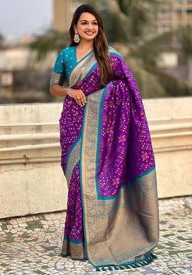 Purple woven self design silk blend patola saree with blouse 3