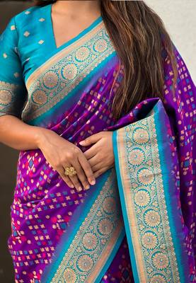 Purple woven self design silk blend patola saree with blouse 4