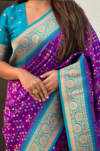 Purple woven self design silk blend patola saree with blouse