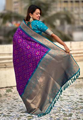 Purple woven self design silk blend patola saree with blouse 5