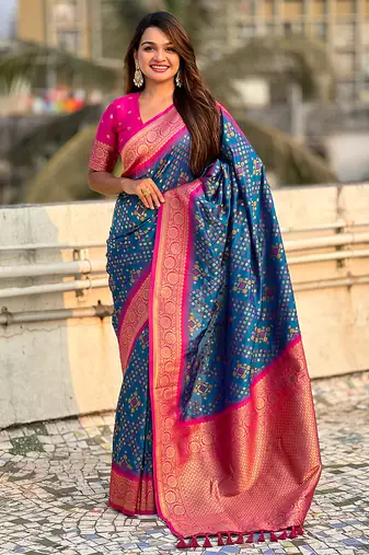 Teal blue woven self design silk blend patola saree with blouse