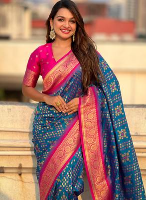Teal blue woven self design silk blend patola saree with blouse 2