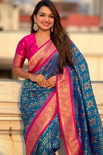 Teal blue woven self design silk blend patola saree with blouse