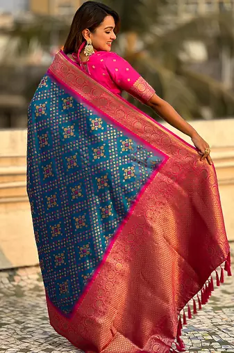 Teal blue woven self design silk blend patola saree with blouse