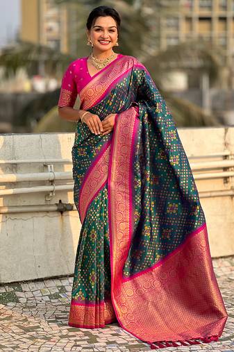 Teal green woven self design silk blend patola saree with blouse