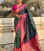 Teal green woven self design silk blend patola saree with blouse