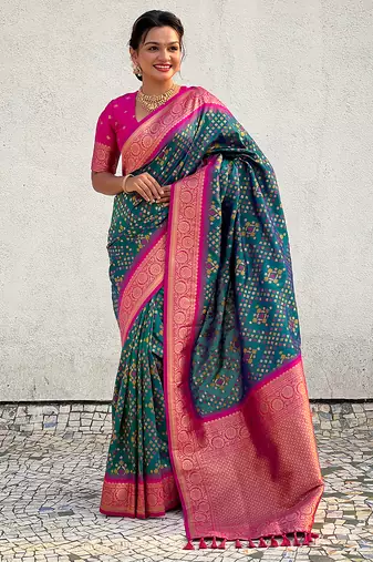 Teal green woven self design silk blend patola saree with blouse