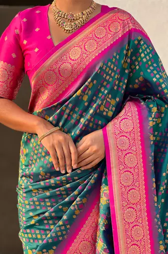 Teal green woven self design silk blend patola saree with blouse