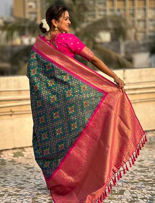Teal green woven self design silk blend patola saree with blouse 5