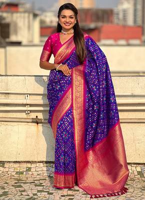 Violet woven self design silk blend patola saree with blouse 1