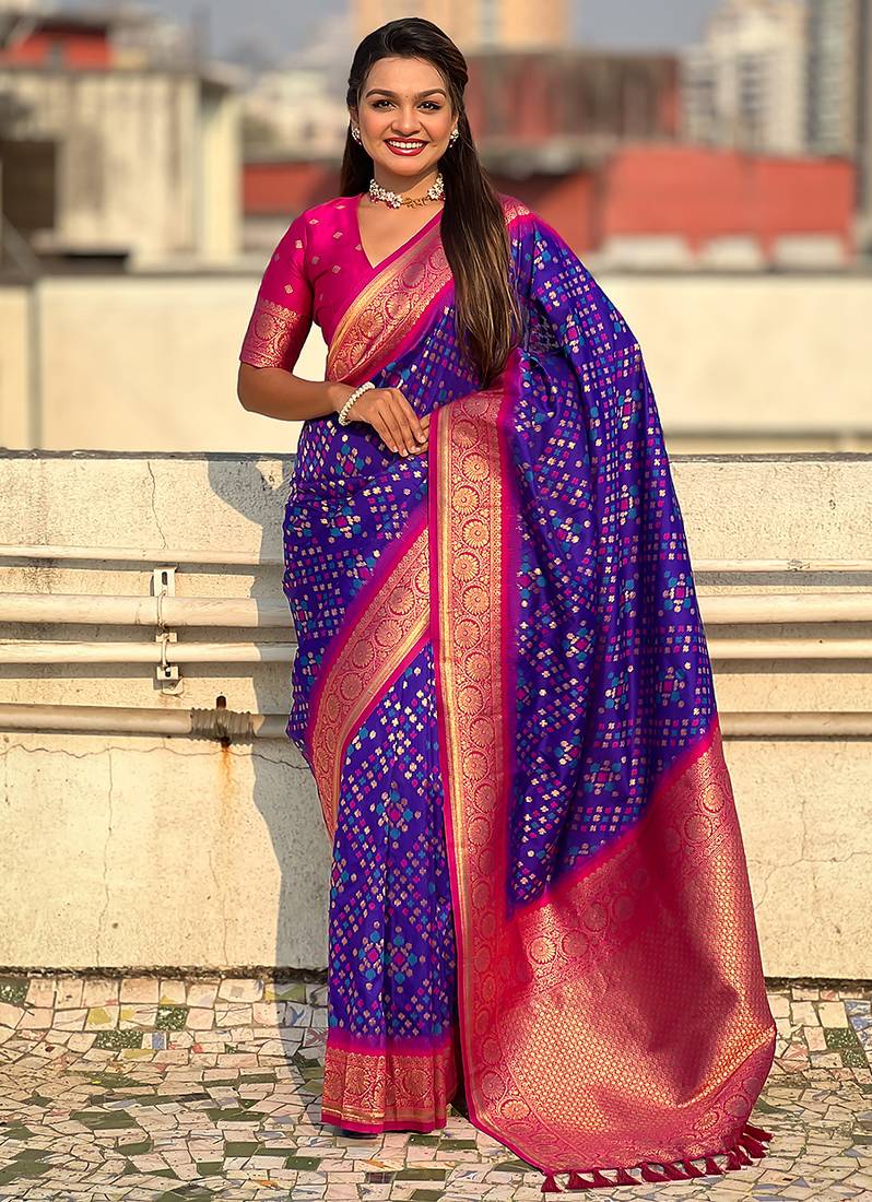 Violet woven self design silk blend patola saree with blouse