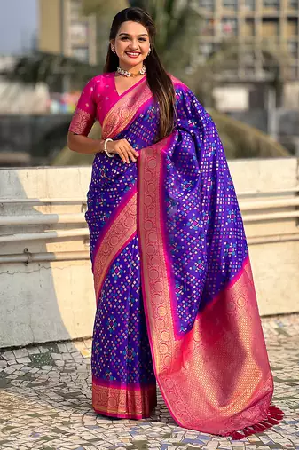 Violet woven self design silk blend patola saree with blouse