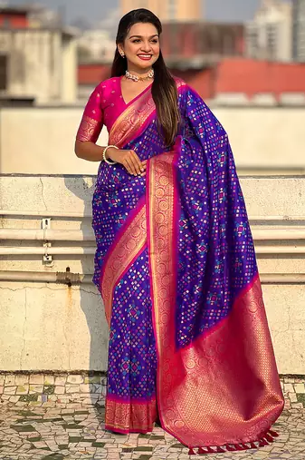 Violet woven self design silk blend patola saree with blouse
