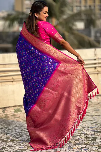 Violet woven self design silk blend patola saree with blouse