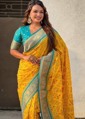 Yellow woven self design silk blend patola saree with blouse 2