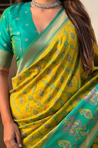Mehendi woven self design silk blend patola saree with blouse