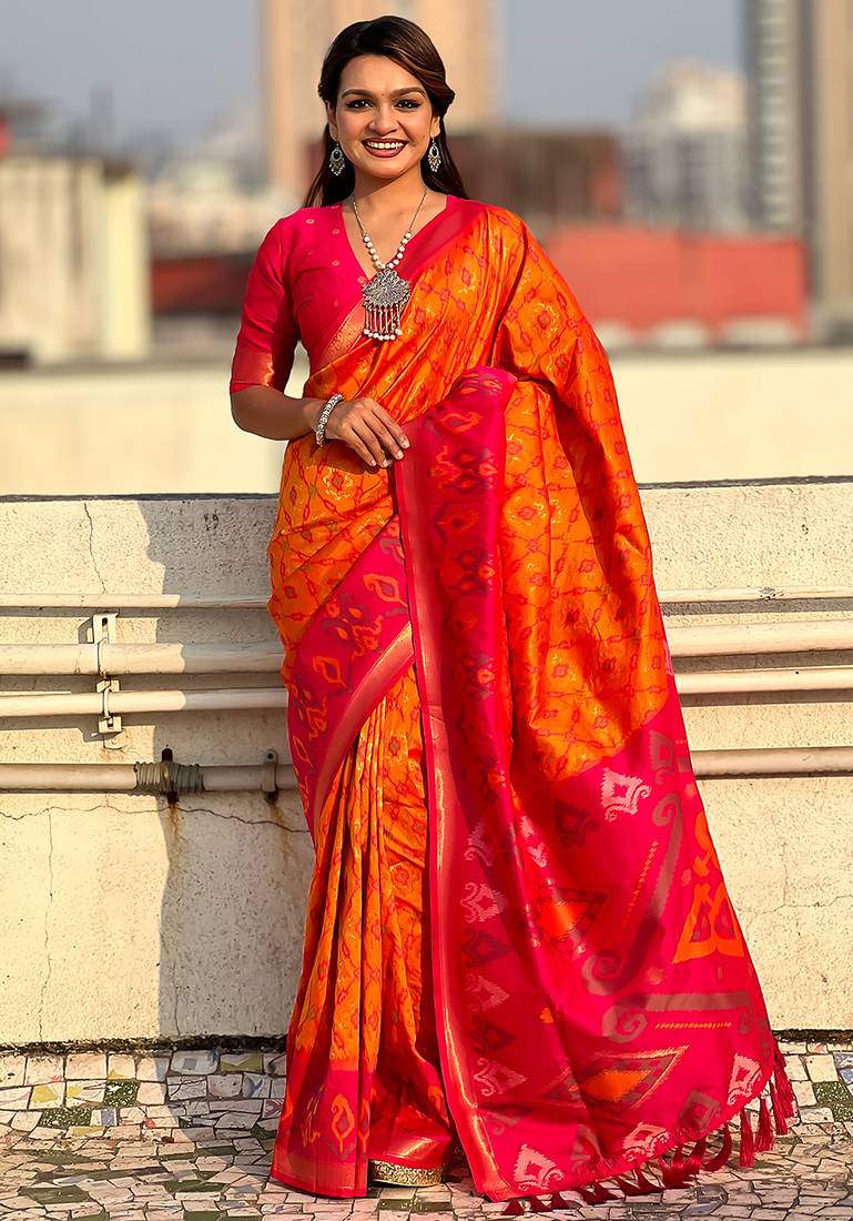 Orange woven self design silk blend patola saree with blouse