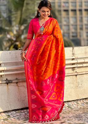 Orange woven self design silk blend patola saree with blouse 2