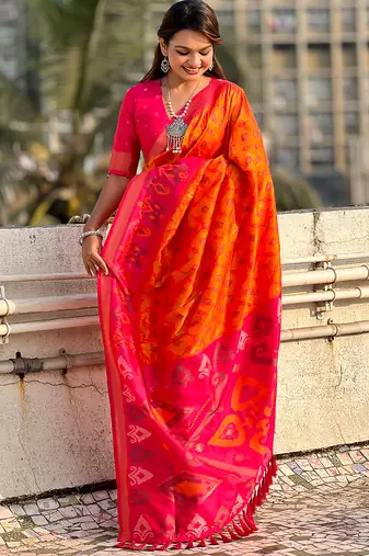 Orange woven self design silk blend patola saree with blouse