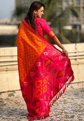 Orange woven self design silk blend patola saree with blouse 4