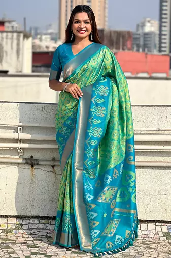 Pista green woven self design silk blend patola saree with blouse