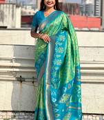 Pista green woven self design silk blend patola saree with blouse
