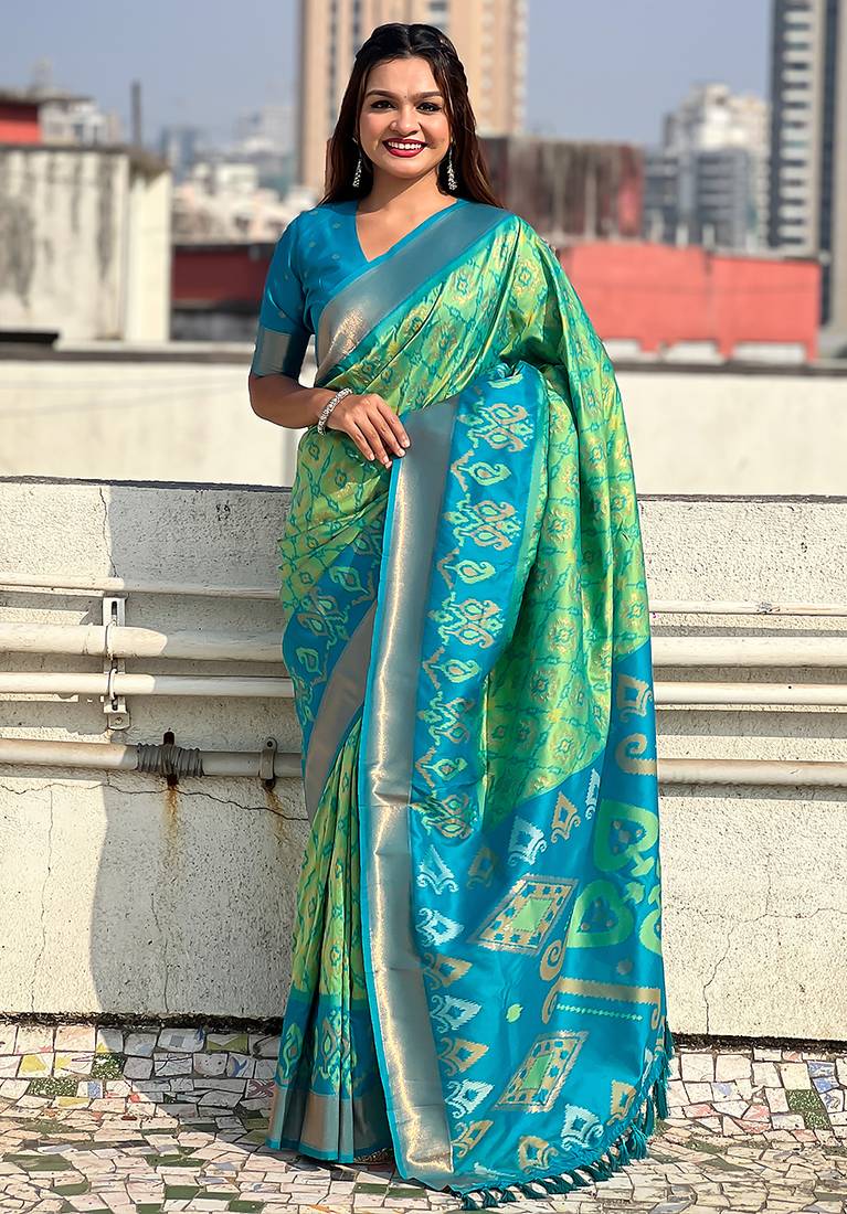 Pista green woven self design silk blend patola saree with blouse