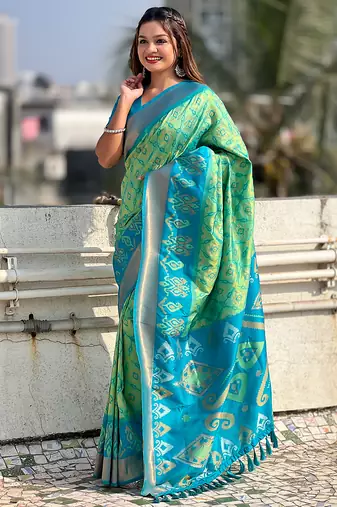 Pista green woven self design silk blend patola saree with blouse