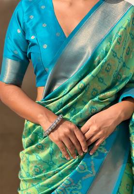 Pista green woven self design silk blend patola saree with blouse 3