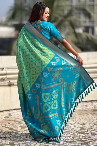 Pista green woven self design silk blend patola saree with blouse